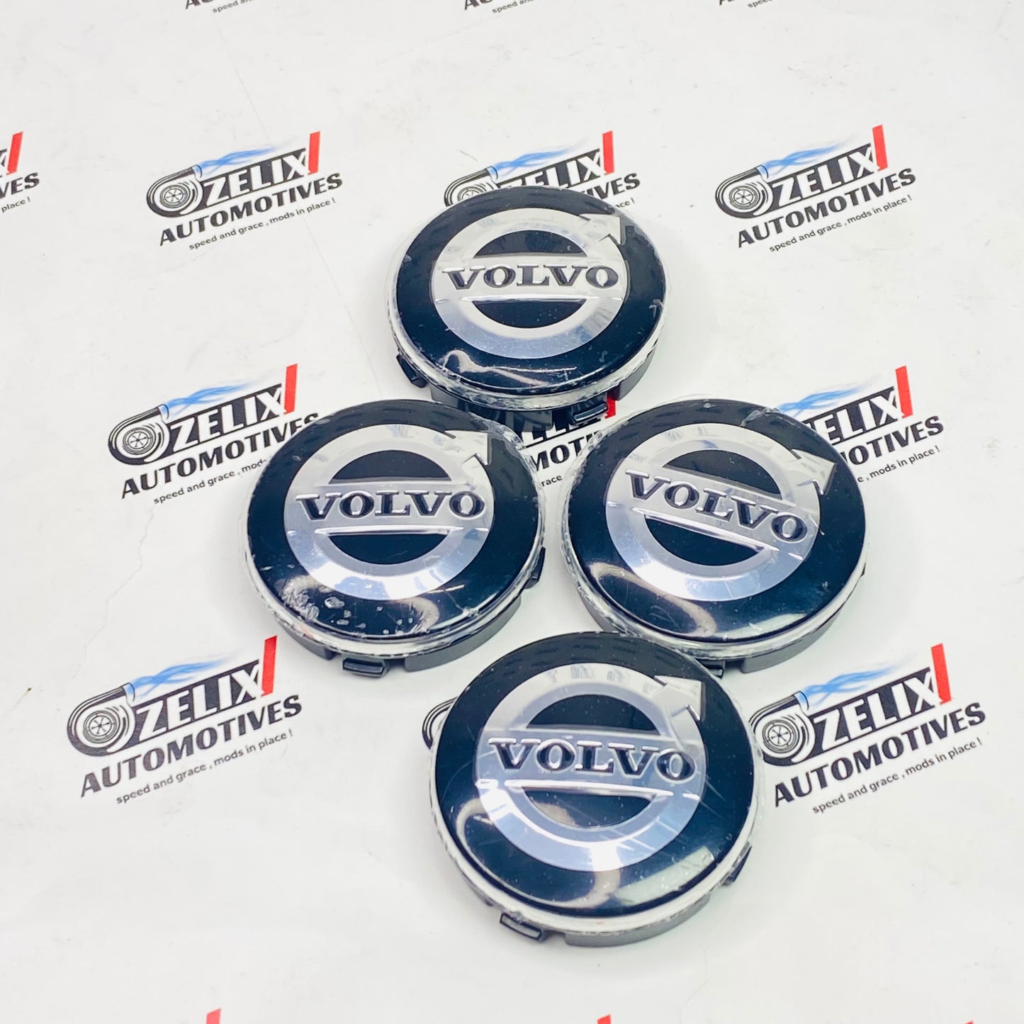 Volvo premium wheel center caps set in Black and silver 