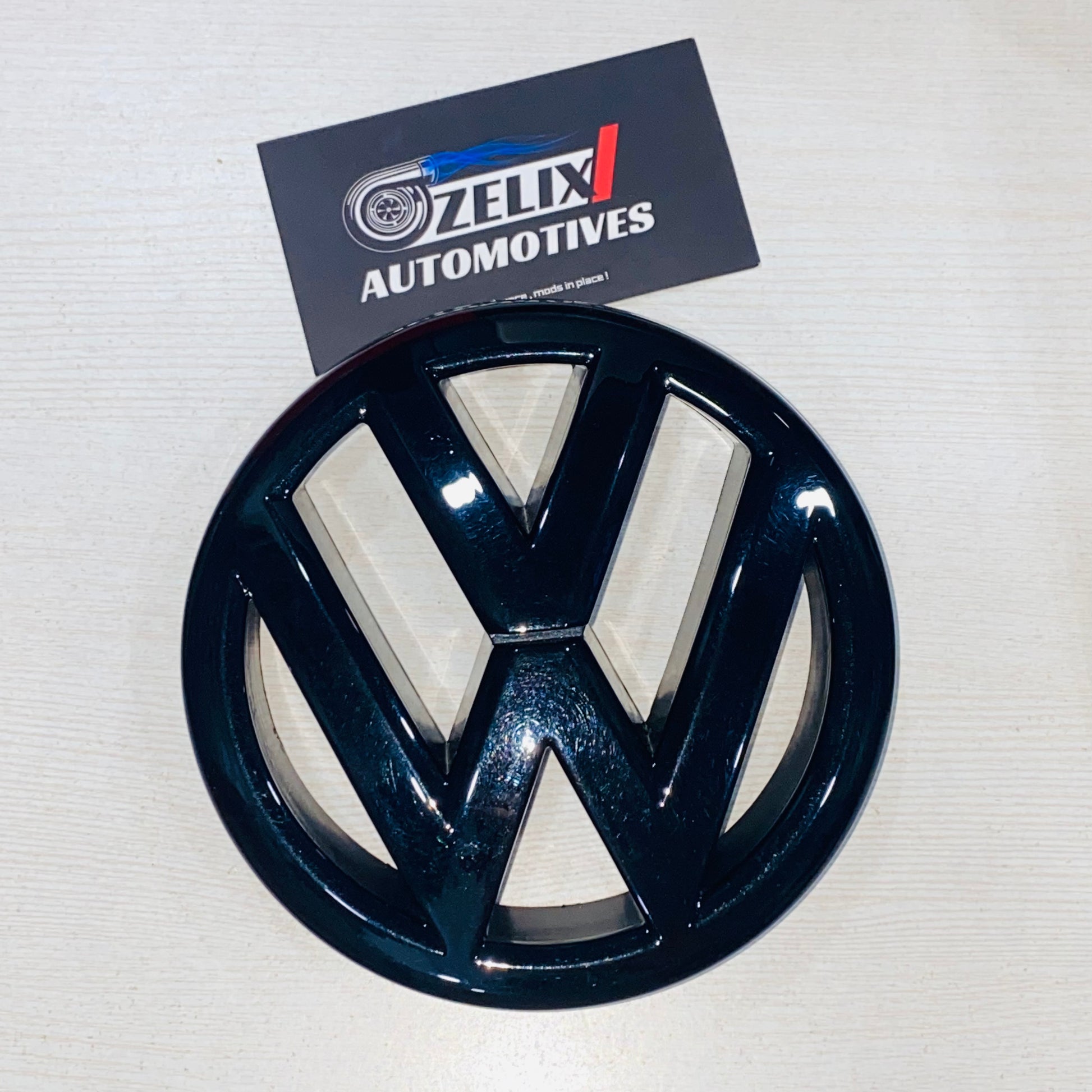 Black Volkswagen Jetta front grill logo 