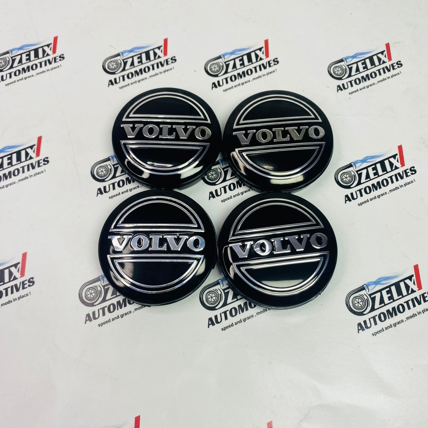 Volvo premium wheel center caps set of 4 in Full Black color 