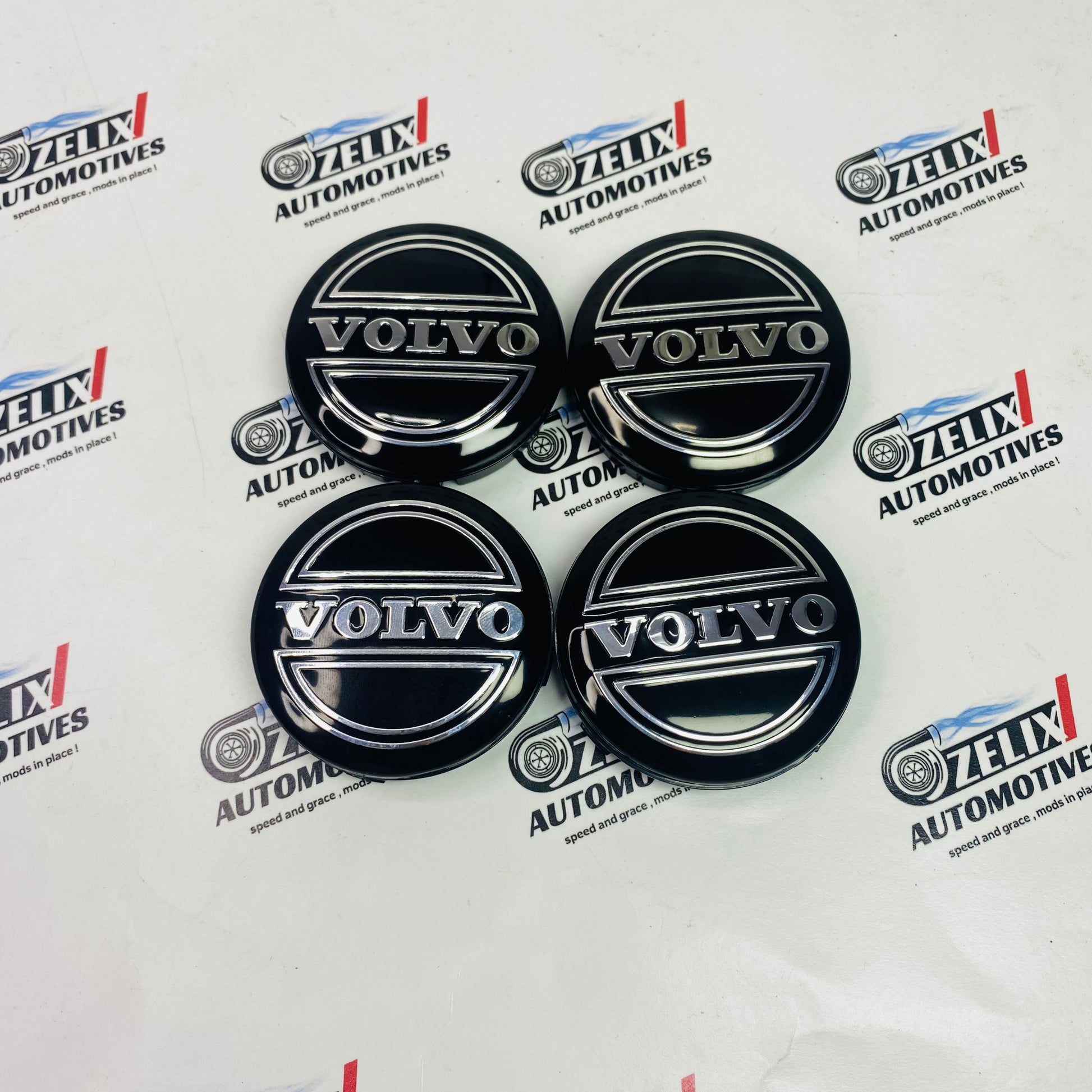 Volvo premium wheel center caps set of 4 in Full Black color 