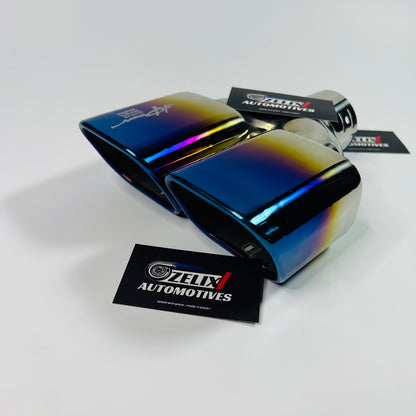 Angled side view of the square twin‑exit stainless steel exhaust tip