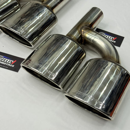 Side profile of AMG-style dual exhaust tip with polished finish