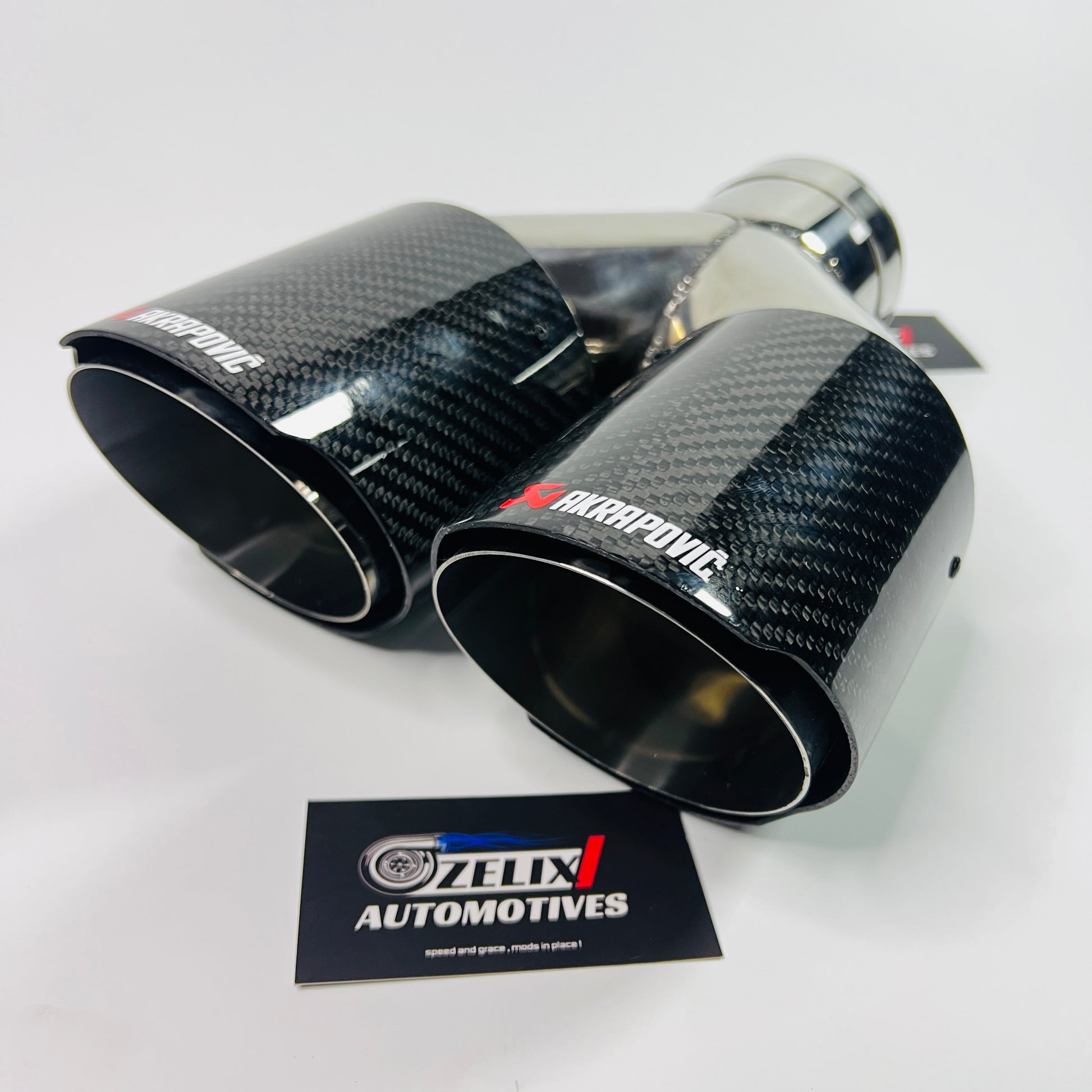 Akrapovic gloss carbon dual tip close-up