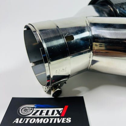 Front view of Akrapovic gloss carbon dual tip
