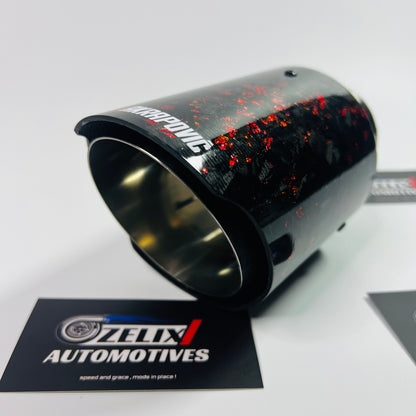 Close-up of red forged carbon texture on Akrapovic exhaust tip