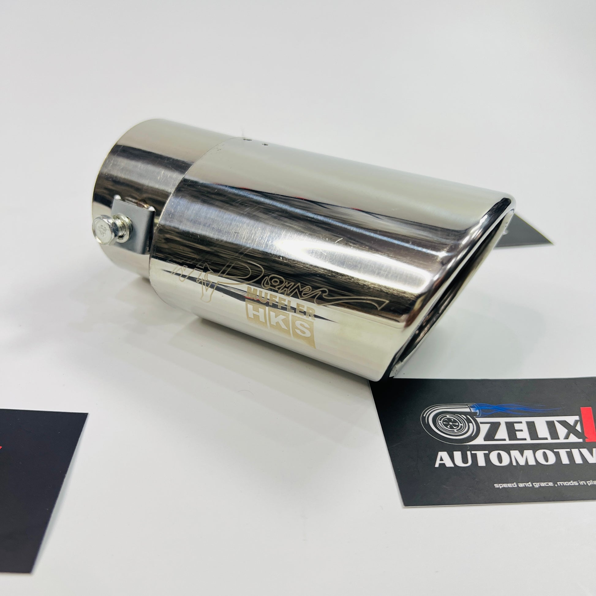 Side view of chrome HKS single exhaust tip