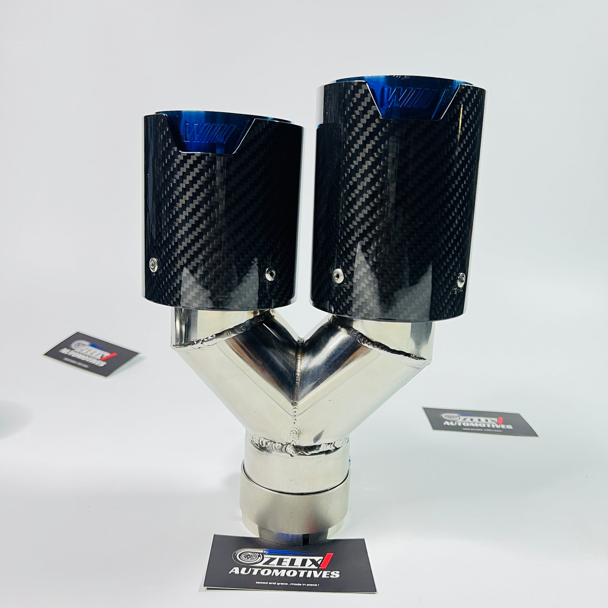 M Style dual tip exhaust on white background