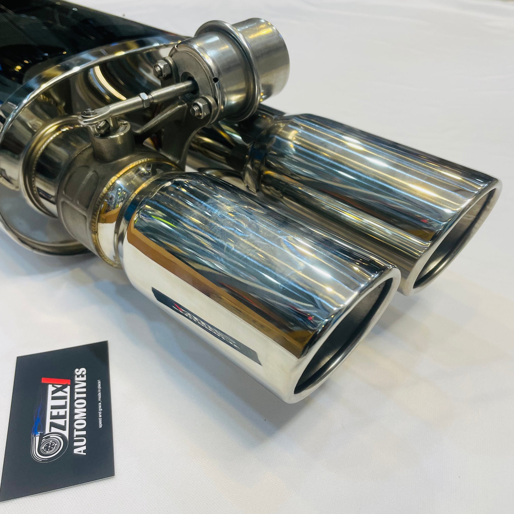 Bevel edge detail on Remus Valvetronic dual-tip exhaust