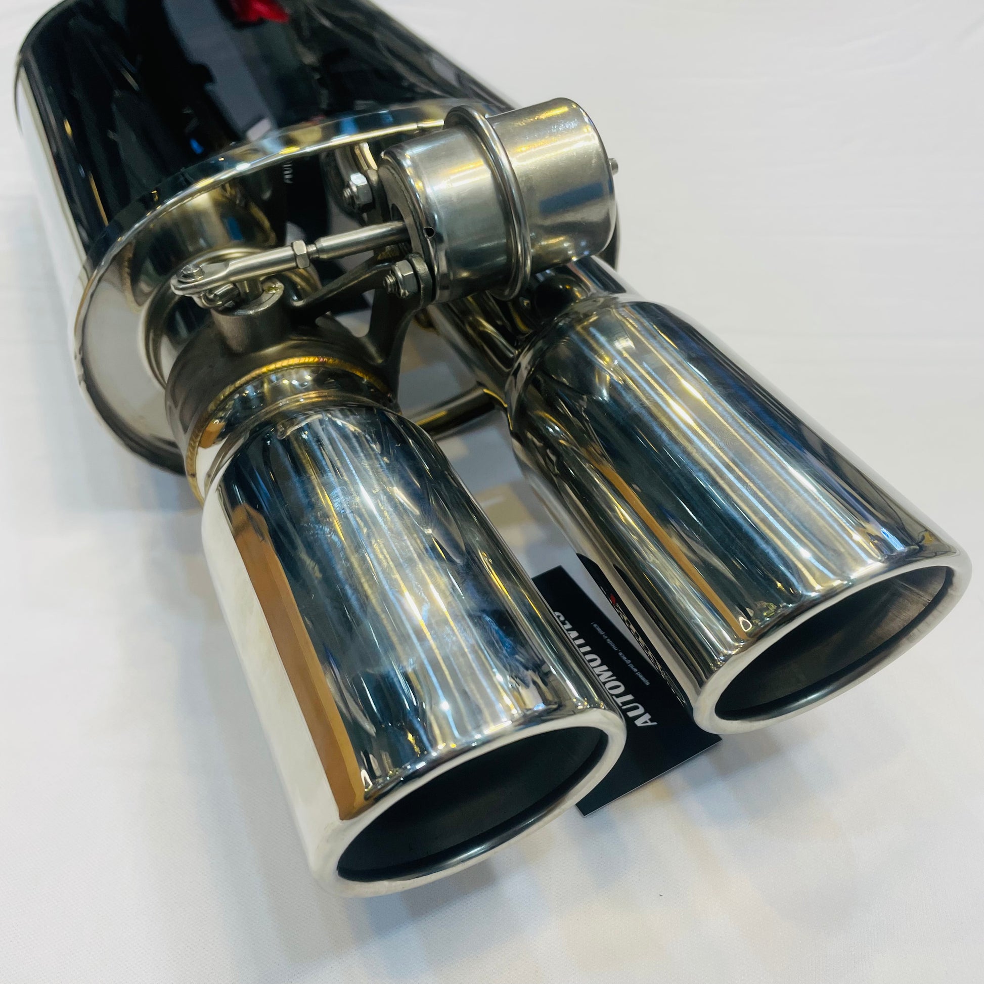 Rear-focused view of Remus Valvetronic dual-tip exhaust