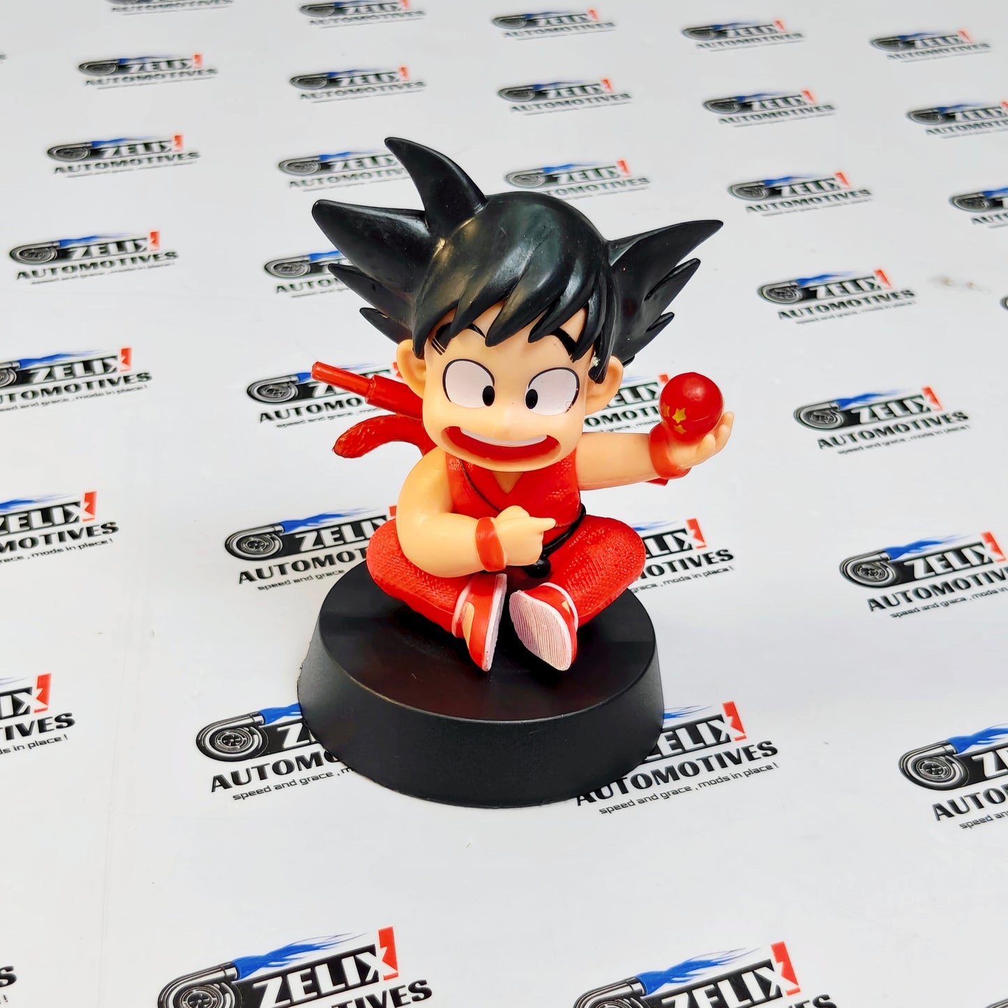 Young Goku-Inspired Car Dashboard Action Figure