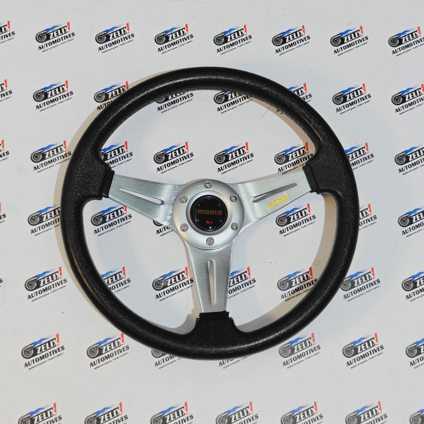 MOMO Flat 3-Spoke Steering Wheel | Racing Inspired