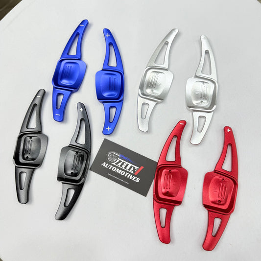 Front view of red aftermarket paddle shifter extender for Volkswagen Virtus