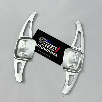 Front view of silver aftermarket paddle shifter extender for Volkswagen Virtus